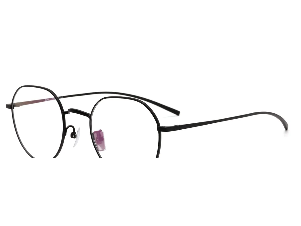 Black pure titanium eyeglass frame model CK9829 shown at an angle