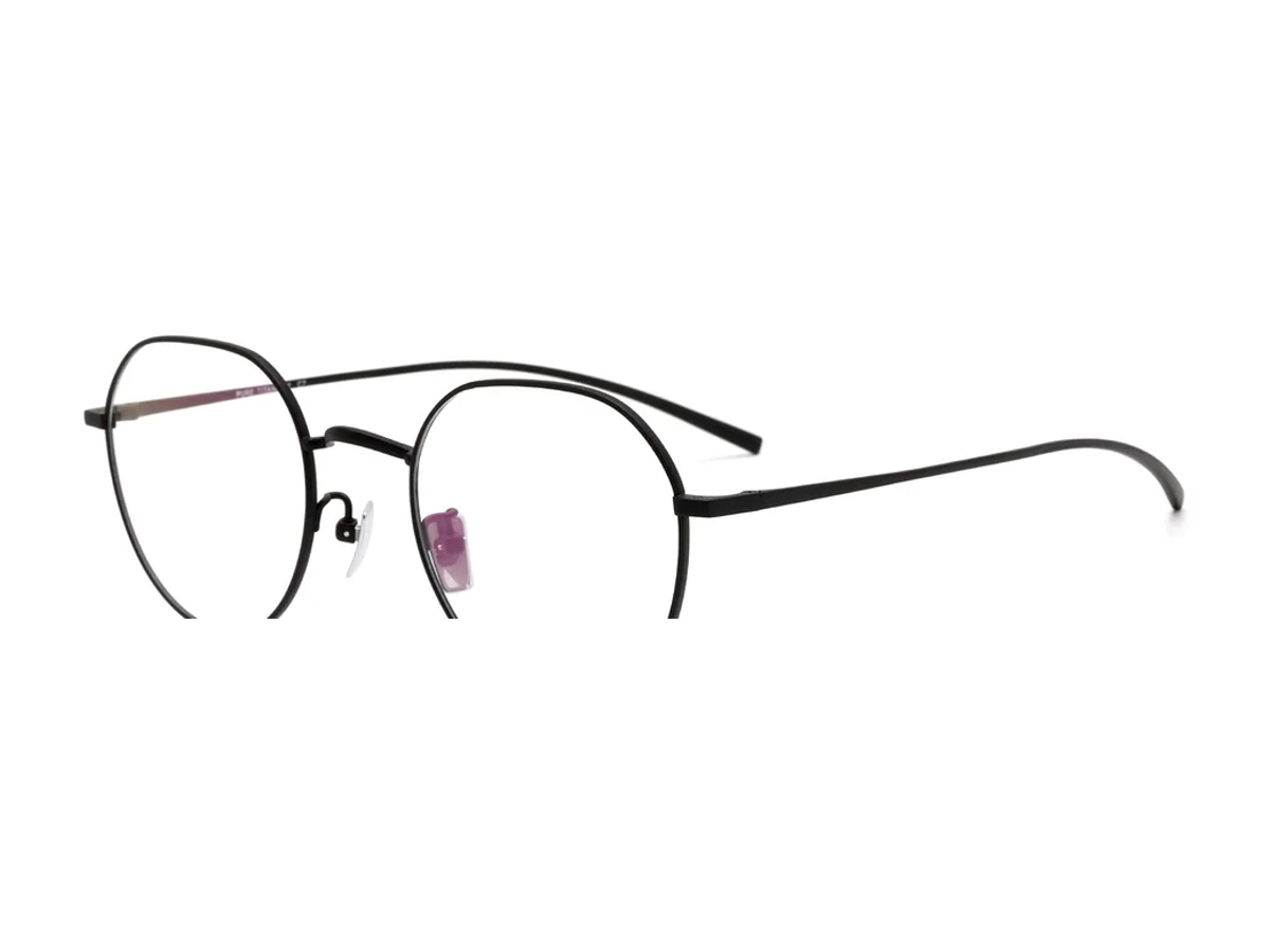 Pure titanium eyeglass frame model CK9829 centered on a white background
