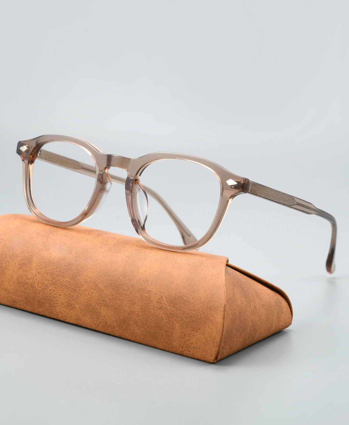Acetate eyeglass frame GG6011F viewed at an angle on a display case