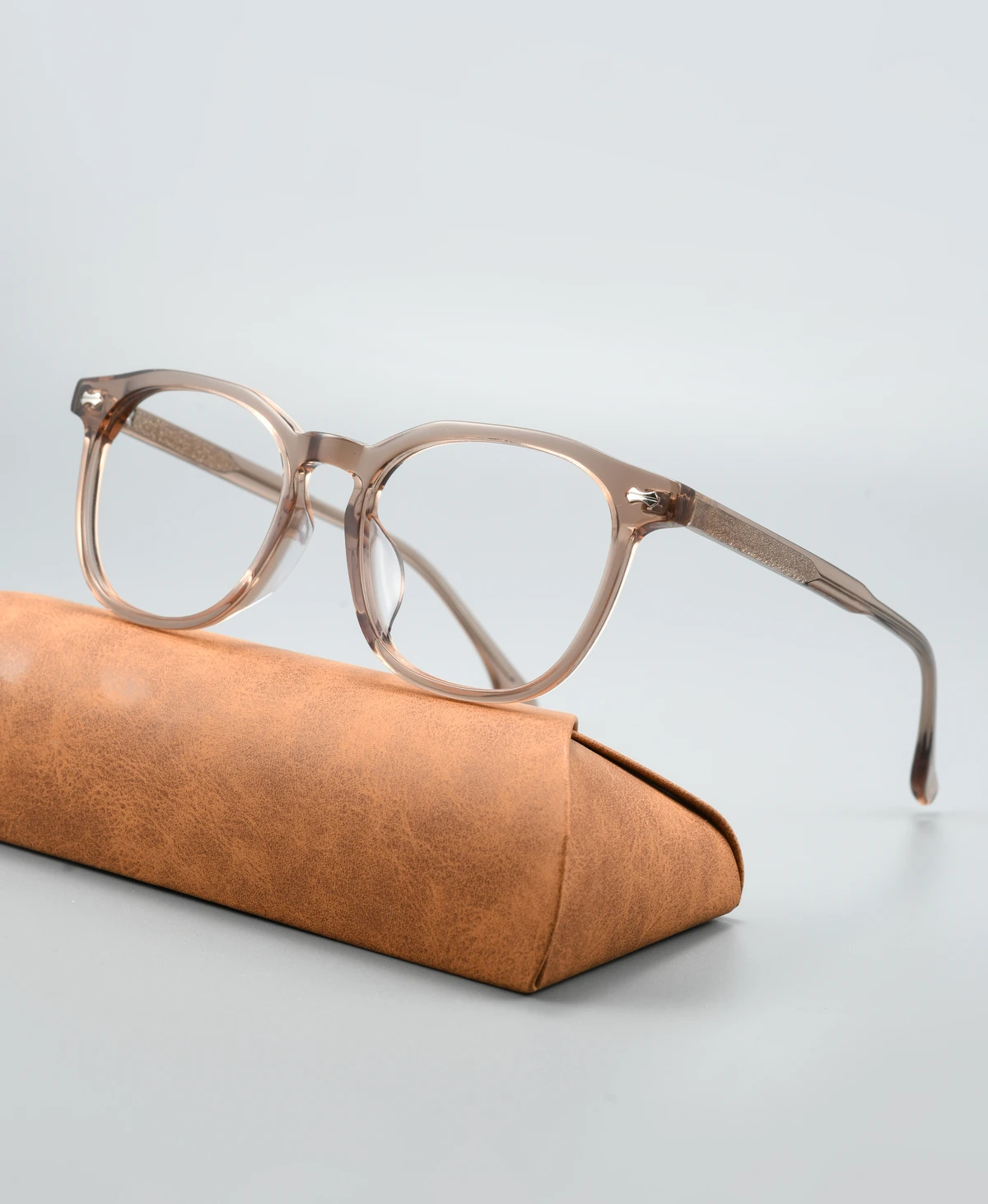Acetate eyeglass frame GG6016F viewed at an angle on a display case